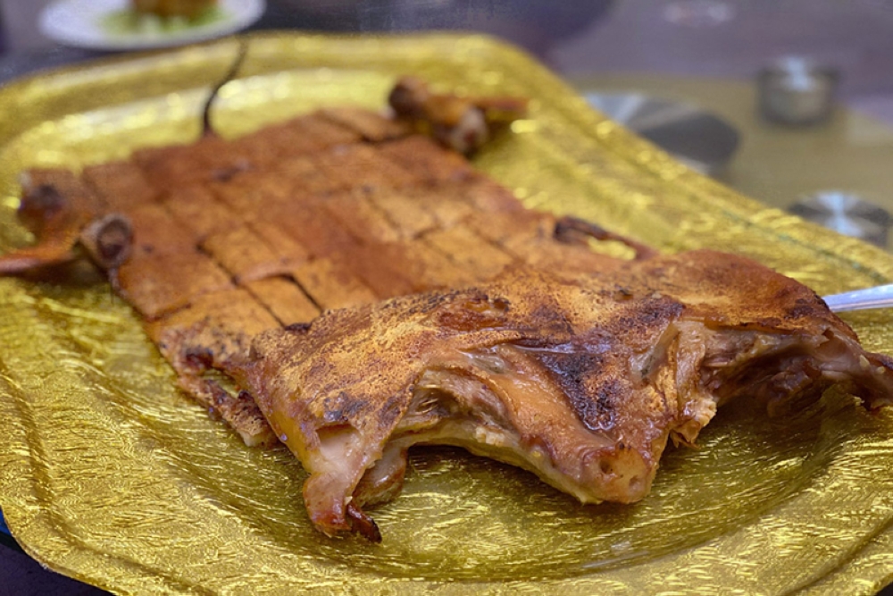 A whole roasted suckling pig.