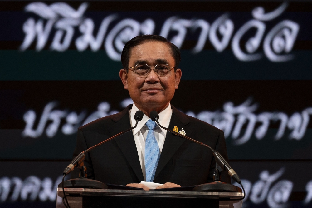 In this file photo taken on August 17, 2022, Thailand's Prime Minister Prayut Chan-o-cha addresses an award function in Bangkok. — AFP pic