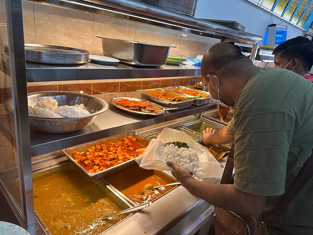 Help yourself to the dishes from the counter for your takeaway.