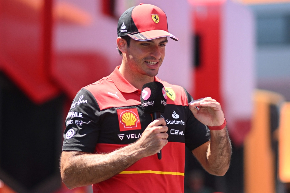Ferrari's Spanish driver Carlos Sainz Jr answers questions of a tv channel on the eve of the start of the Formula One French Grand Prix 2022, on the Circuit Paul Ricard in Le Castellet, southern France, on July 21, 2022. — AFP pic