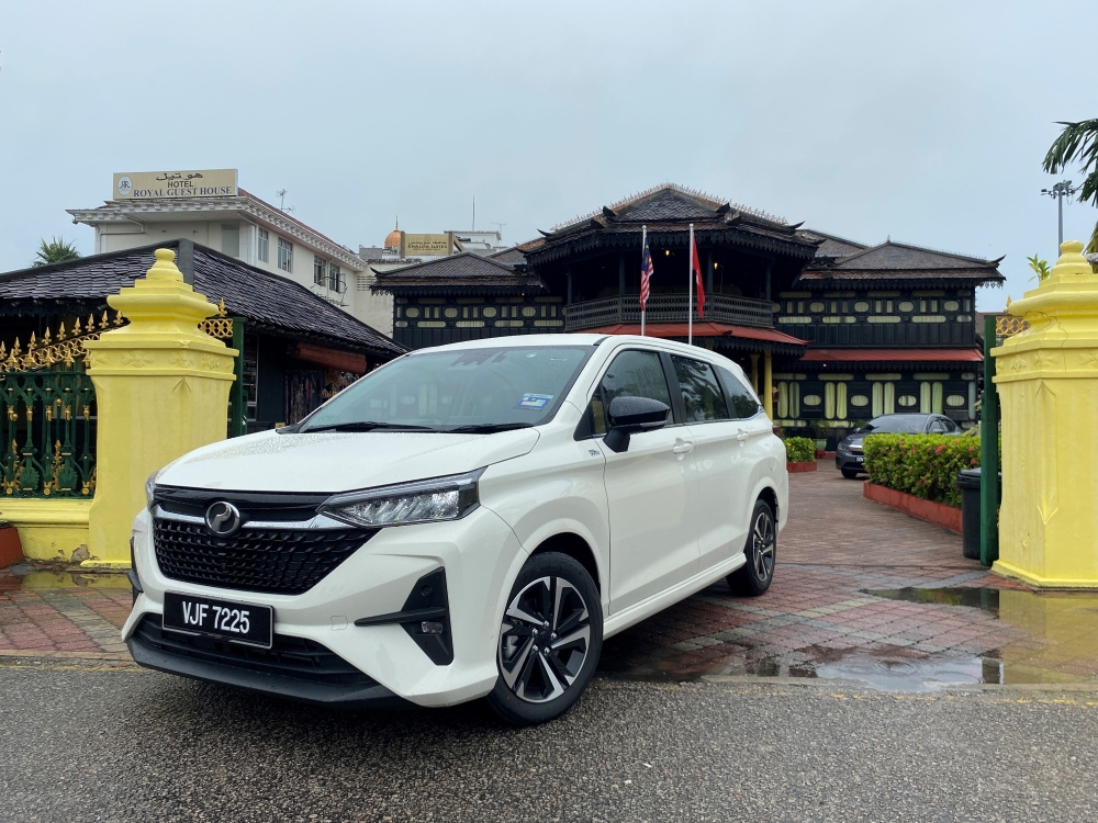 The platform, transmission, design, technology, and the overall packaging are all new.  — Picture by Amirul HazmiPETALING JAYA, Jan 27 — It is safe to say that the 2022 Perodua Alza was the most talked about car last year for various reasons.One of them is, of course, the fact that it is the most competitively-priced car of its kind you can buy today.But is it really the car to go to if you are looking for a family vehicle under RM80,000?The Alza is a seven-seater and there are quite a number of approaches to look at it. We sampled the range-topping 1.5 V, priced at RM75,500.What is it?In this day and age, the lines between MPV (multi-purpose vehicle), crossover and SUV (sports utility vehicle) have become blurred, partly affected by marketing exercises.To put them simply, let us categorise the segment from ground clearance point of view.The Perodua Alza has a 150mm ground clearance, closer to the Proton Exora which rides at 155mm, positioning these two models in the MPV category.Meanwhile, the Toyota Veloz, Honda BR-V and the Mitsubishi Xpander have much higher ground clearances at more than 190mm, making them more of an SUV or crossovers.The difference between the new Perodua Alza and the previous one is like night and day; the only thing they share is the name.The platform, transmission, design, technology, and the overall packaging are all new.Key features on the new Alza (depending on the variants) include full LED headlights with Auto High Beam, 16-inch wheels, fully-digital instrument cluster, Android Auto and Apple Carplay connectivity, rear air-conditioning vents, new D-CVT transmission, electronic parking brake, 360 camera, and a whole list of safety tech under ASA 3.0 (Advanced Safety Assist 3.0).More practical than everIn terms of appearance, despite being an MPV, I found myself treating the Alza as a station-wagon during the week I drove it.Maybe I am one of those guys who refuse to believe that they need an MPV at this point of life, perhaps owning a wagon is a good transition I suppose.In fact, Perodua also shared that most of Alza owners only use two rows of seats most of the time, so yeah, a front-wheel drive, five-seater, lots of cargo space wagon anyone?Space is one of the most crucial factors in this kind of car and the new Perodua Alza did not disappoint.Second and third row seats were satisfyingly roomy. You can slide the second-row seats back and forth around 40cm to adjust the spaces between the two rear rows as well as to allow for better access to the third row.I have to be honest though, the first-row seats are now less spacious compared to the old Alza, a ‘sacrifice’ to a more modern and driver-focused dashboard design with a rather premium centre console.Speaking of which, the overall quality here in the cockpit is the best you can get for the price bracket, it did not feel too cheap.The hard plastic surfaces here appeared rather contemporary and most buttons have good tactile feel to them.It is worth mentioning that the third-row seats offer good seating posture even for adults, the floor was not too high so you do not feel like you are crouching.A rather sophisticated driveUnder the hood of the Perodua Alza is the familiar 1.5-litre petrol engine with around 105hp and 138Nm of torque, paired to a new D-CVT transmission.Is it underpowered? While the Alza is not going to be supremely potent like the RM260,000 2.2 diesel Kia Carnival, it offered a more than sufficient punch to get you going.Having driven the Alza with five adults together with luggage, through the hilly Bukit Tinggi and twisty Karak highway, I have to say I have no complaints on the Alza’s powertrain.The D-CVT helped spread the powerband along the rev range while providing a good balance between performance and fuel economy.It is not going to deliver the advertised 22km/litre in the real-world driving, but the Alza can peak at 18km/litre when driven light-footedly.There’s a set of new driving modes where you can engage from the steering wheel, but to me, the more efficient way of getting more performance and control out of the car was by engaging the gear lever from D to S.Here, the engine will run at a higher rev giving you more juice, then when off the throttle, the gearbox retained the rpm simulating engine braking, good for tackling corners and going downhills.Yes, this is not a sports car but we have to bear in mind the Alza might be the only car in some households.So, it may be driven to send the kids to school and out of the city. A one-for-all kind of car for some families.In essence, if you need the space to carry up to seven people and you do not need the high ground clearance and heavy-duty chassis from the Aruz, then the Perodua Alza is the best car you can buy today.At the price, it offers a great package of practicality, features, safety, and value.Here are more snapshots of the vehicle.