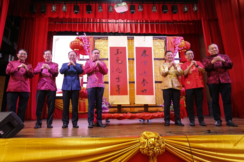 Transport minister Anthony Loke (fourth left) attends the Malaysia-China Chamber of Commerce Lunar New Year celebration at the KL& Selangor Chinese Assembly Hall in Kuala Lumpur January 28,2023. — Picture by Ahmad Zamzahuri
