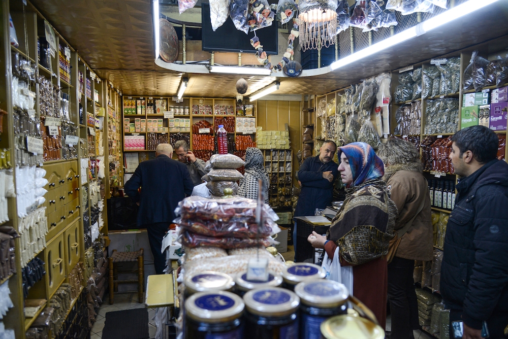 Clients shop at the herbal shop “Joseph the Blind”, established in 1891 is at work in Diyardakir, on December 12, 2022. — AFP pic