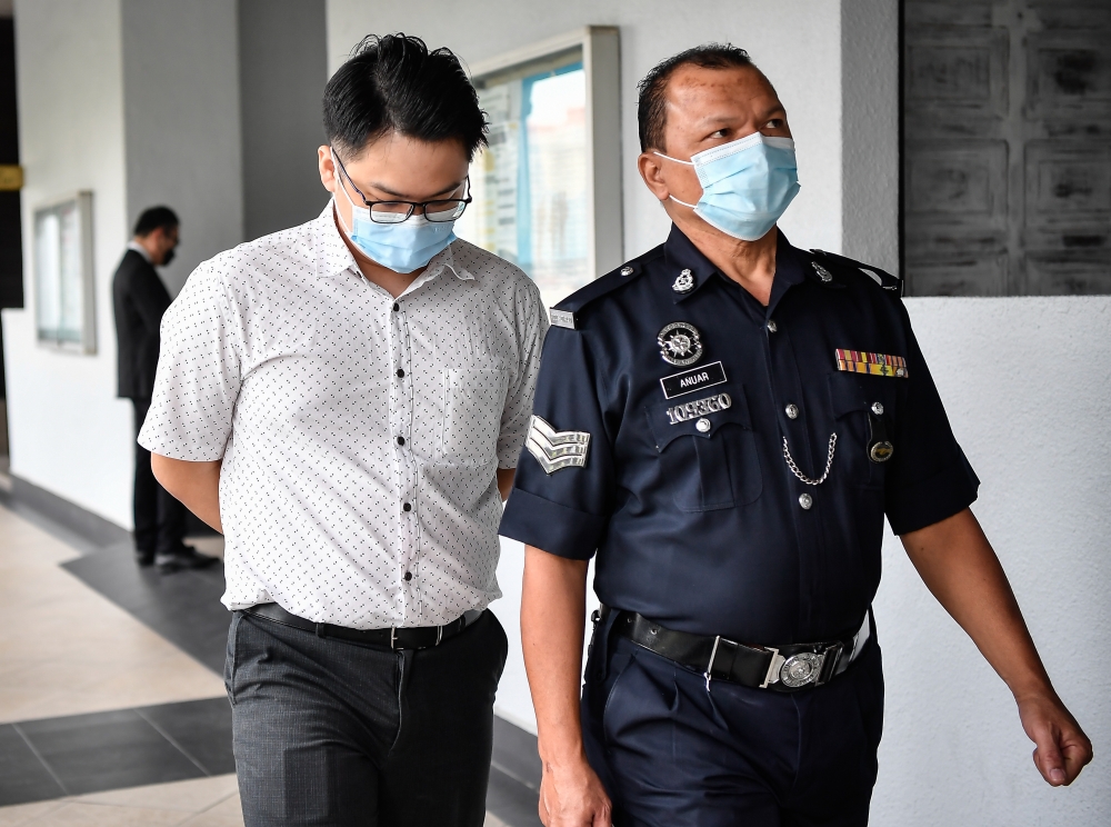 Raymond Sim, 35, pleaded not guilty to all the charges which were allegedly committed at the Socso branch offices in Petaling Jaya and Klang between March 9 and Nov 11, 2021. — Bernama pic