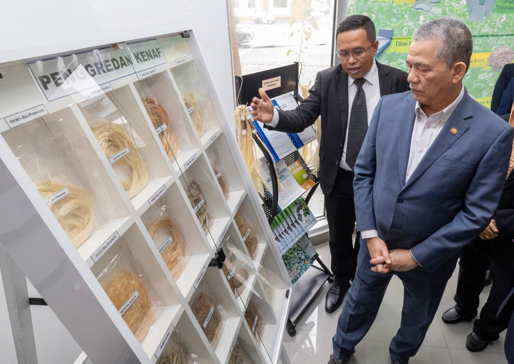 Deputy Prime Minister Datuk Seri Fadillah Yusof (right) looks at kenaf-based products after a briefing on the development of the kenaf industry and regulation of the tobacco industry at the National Kenaf and Tobacco Board (LKTN) Headquarters in Kota Baru January 30, 2023. — Bernama pic