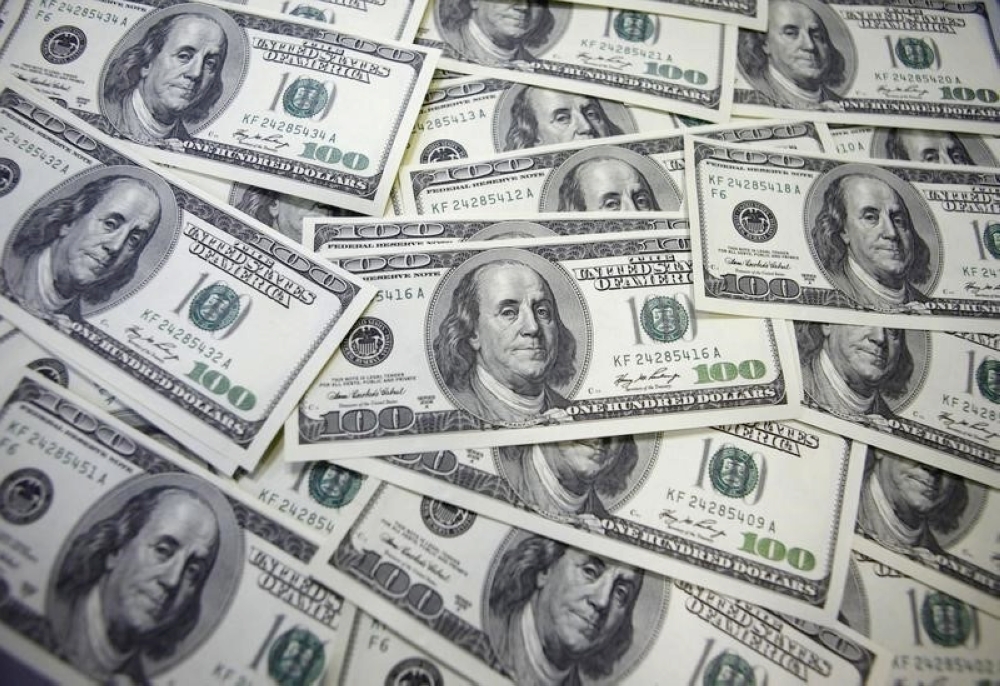 Dollar pares gains on falling US labour costs, before Fed decision - Vimarsana News