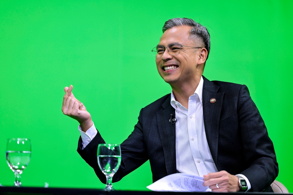 Minister of Communications and Digital Fahmi Fadzil speaks during an interview on BernamaTV’s ‘Ruang Bicara’ programme at Wisma Bernama, Kuala Lumpur January 31, 2023. — Bernama pic