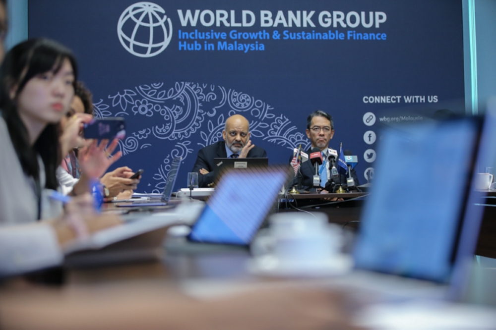World Bank lead economist Apurja Sanghi speaks during a press conference at Sasana Kijang in Kuala Lumpur February 3, 2023. — Picture by Ahmad Zamzahuri