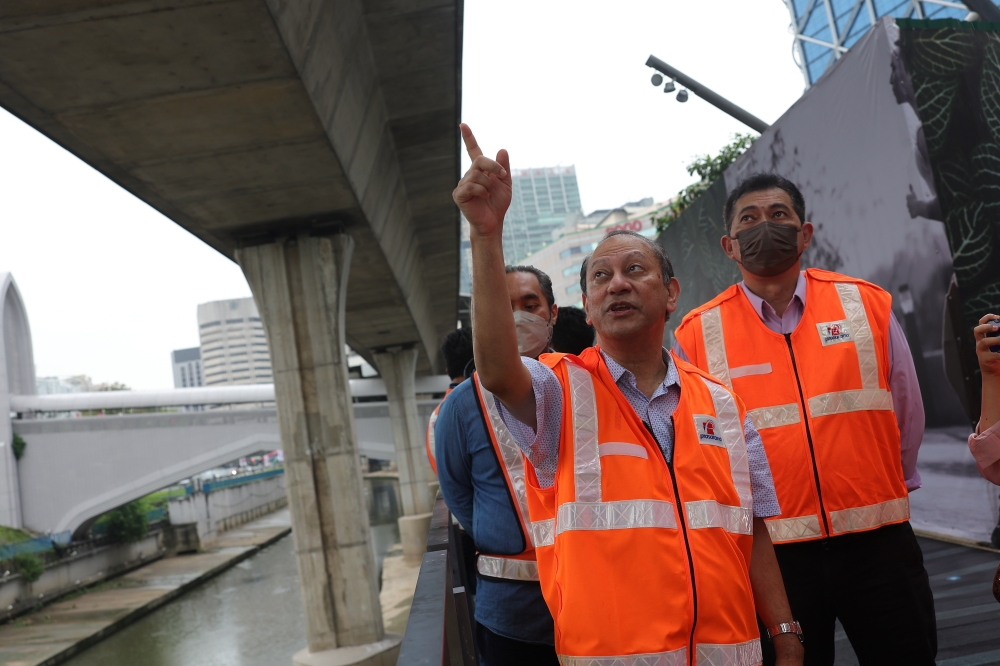 Prasarana Malaysia Berhad group chief operating officer (Strategy and Development) Prodyut Dutt inspecting the structural damage at the Bandaraya LRT station, February 3, 2023. — Bernama pic