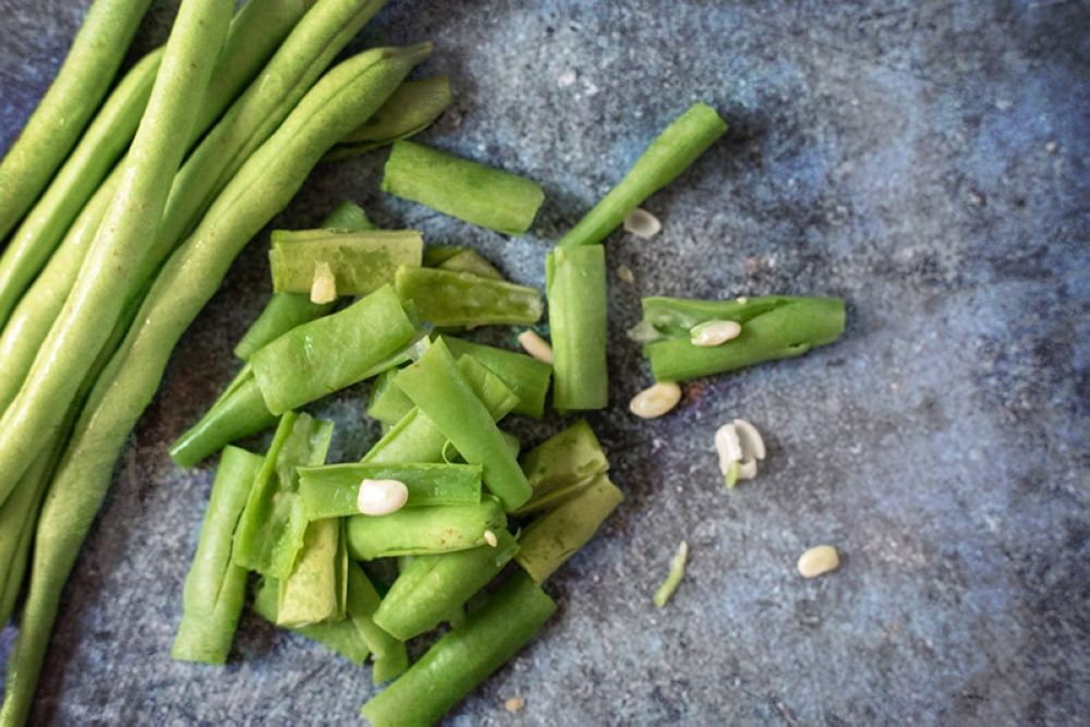 Fresh French beans add a vibrant green.
