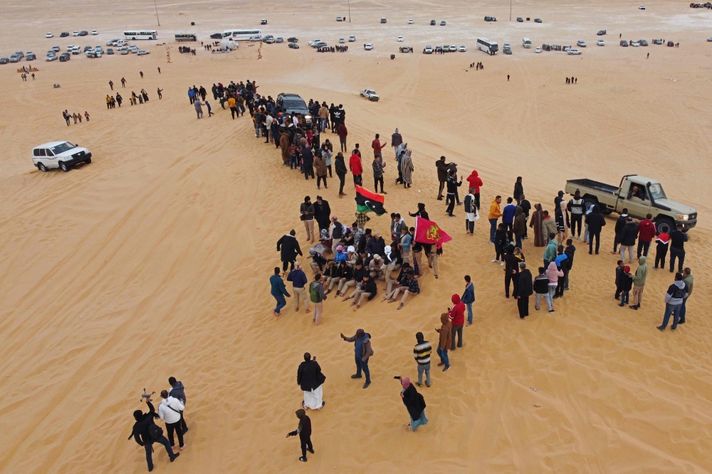 An aerial view shows people gathering in al-Ramla area near the Libyan town of Ghadames, a desert oasis some 650 kilometres southwest of the capital Tripoli, on February 2, 2023. ― AFP pic