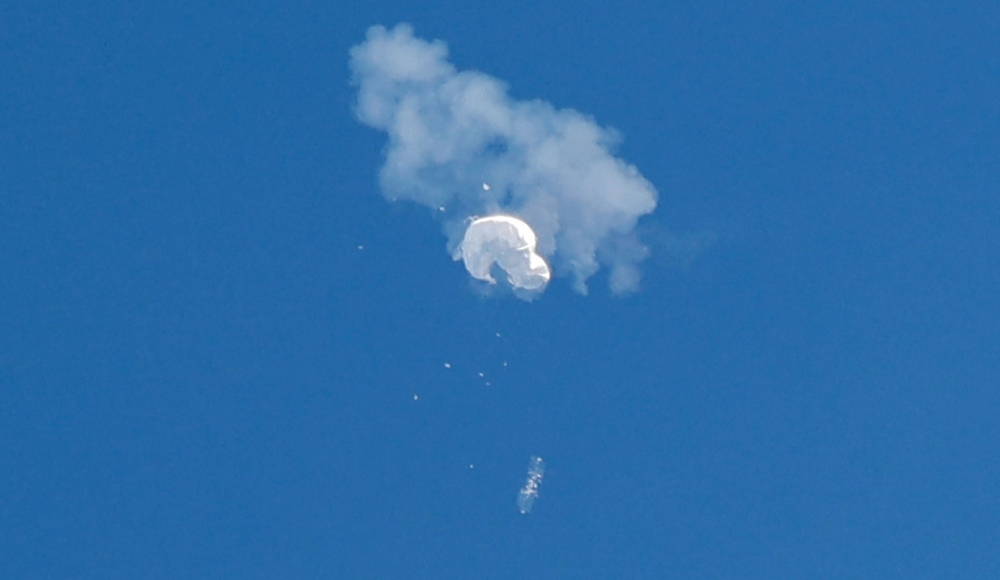 The suspected Chinese spy balloon drifts to the ocean after being shot down off the coast in Surfside Beach, South Carolina February 4, 2023. — Reuters pic