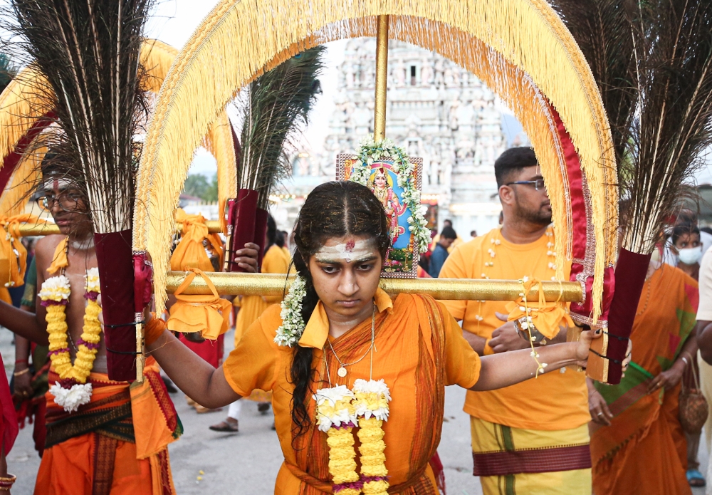 A devotee carries a kavadi in conjunction with Thaipusam at the Sri Maha Mariamman Temple in Buntong, Ipoh. — Picture by Farhan Najib