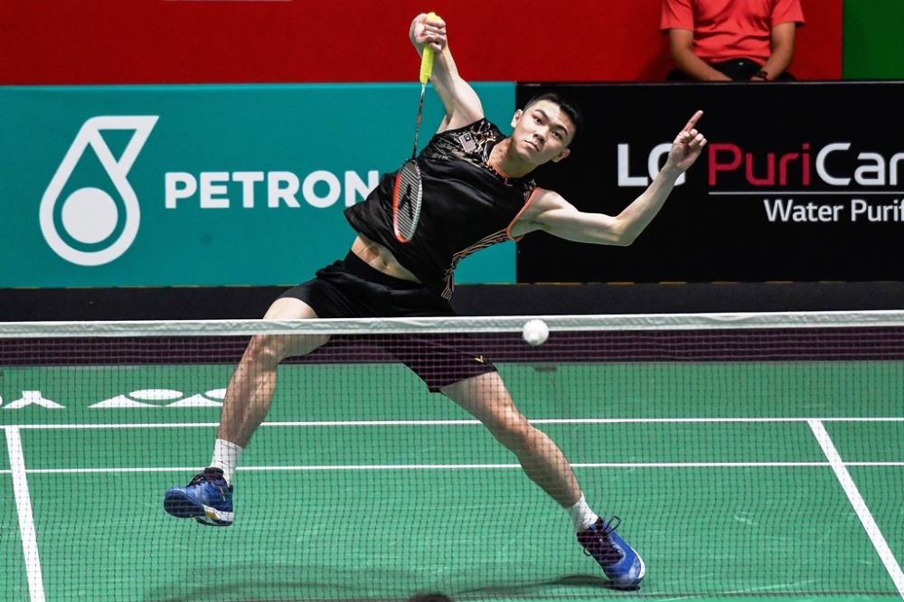 Malaysia's Zii Jia Lee competes against  Shesar Hiren Rhustavito from Indonesia (not pictured) during the second round of the Malaysian Open 2022 at the Axiata Arena Bukit Jalil, Kuala Lumpur June 30, 2022. — Bernama pic 