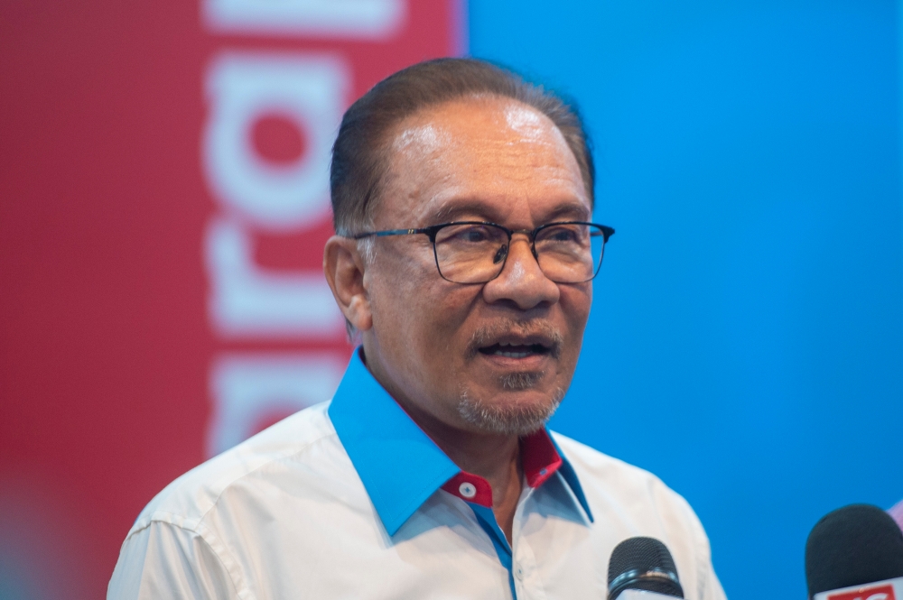 Prime Minister and PKR president Datuk Seri Anwar Ibrahim speaks to the media during PKR press conference at Keadilan headquarter in Petaling Jaya February 6, 2023. — Picture by Shafwan Zaidon