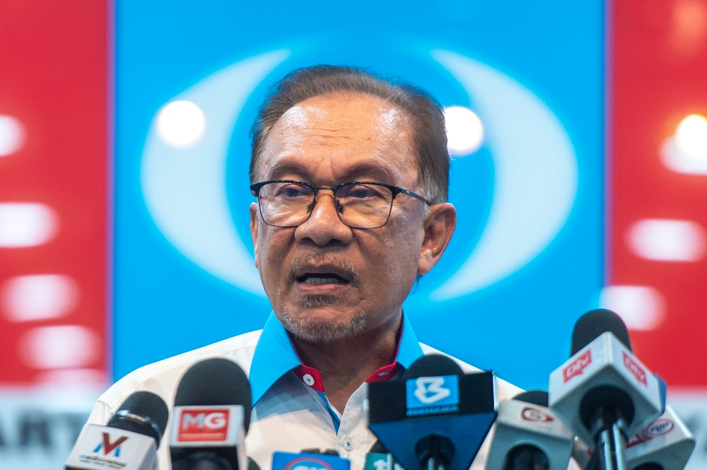 Prime Minister and PKR president Datuk Seri Anwar Ibrahim speaks to the media during PKR press conference at Keadilan headquarter in Petaling Jaya February 6, 2023. — Picture by Shafwan Zaidon