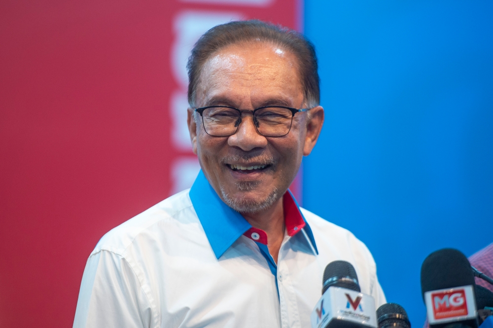 Prime Minister and PKR president Datuk Seri Anwar Ibrahim speaks to the media during PKR press conference at Keadilan headquarter in Petaling Jaya February 6, 2023. — Picture by Shafwan Zaidon