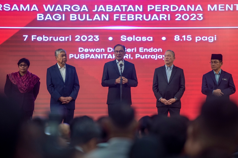 Prime Minister Datuk Seri Anwar Ibrahim speaks to government officers during the Prime Minister’s Department monthly assembly at Puspanitapuri in Putrajaya February 7, 2023. — Picture by Shafwan Zaidon