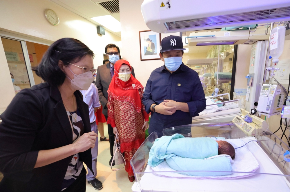 Deputy Health Minister Lukanisman Awang Sauni (right) is seen during a visit to the Sabah Women and Children Hospital in Kota Kinabalu February 7, 2023. — Bernama pic