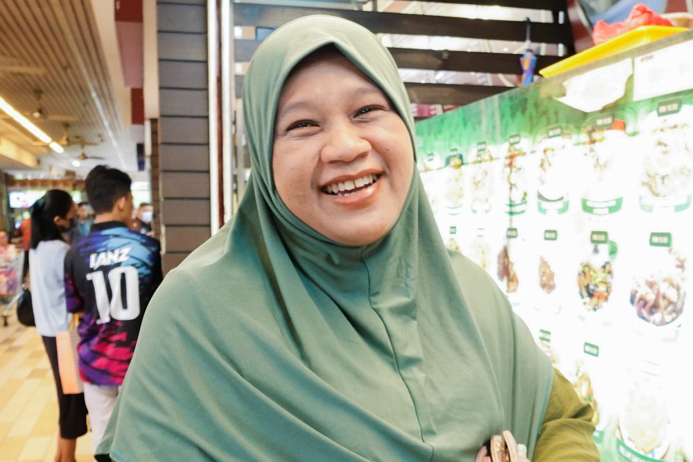 Menu Rahmah customer Nurul speaks to Malay Mail reporters during an interview at Mydin USJ February 6, 2023. — Picture by Miera Zulyana