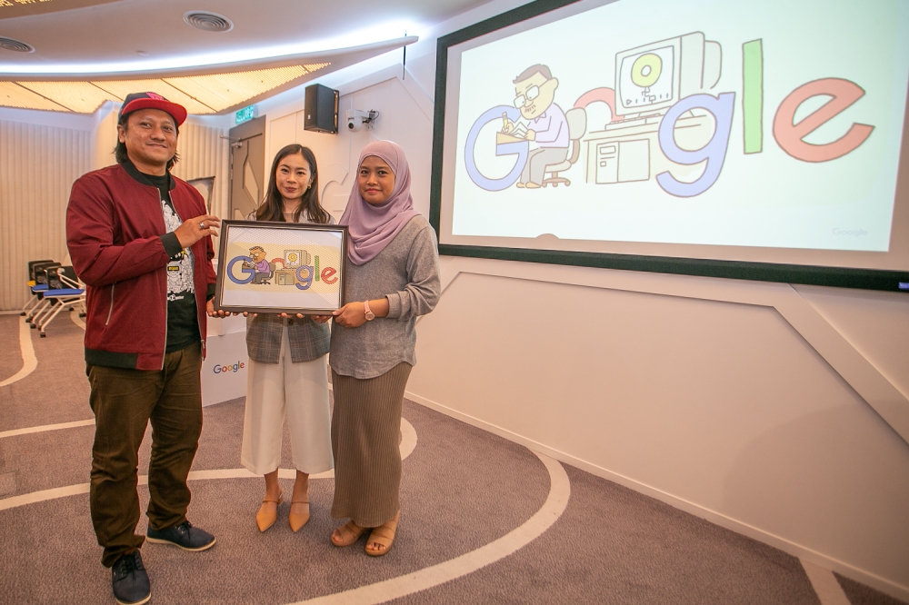 Quest Animation CEO Muhamad Firdaus, Google Malaysia Product Marketing Manager Judy Wong and Dalila Kamarudin during an event honouring local cartoonist Kamn Ismail at the Google Malaysia office in Axiata Tower, Kuala Lumpur February 7, 2023. — Picture by Raymond Manuel