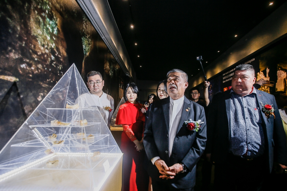 Minister of Agriculture and Food Security Datuk Seri Mohamad Sabu (2nd right) and Asiawalit General Manager Datuk Chua Hai Gen (right) visit the showroom during a work visit to Asia Walit Resource Sdn Bhd at Puchong City Centre Industrial Park February 7, 2023. — Picture by Hari Anggara