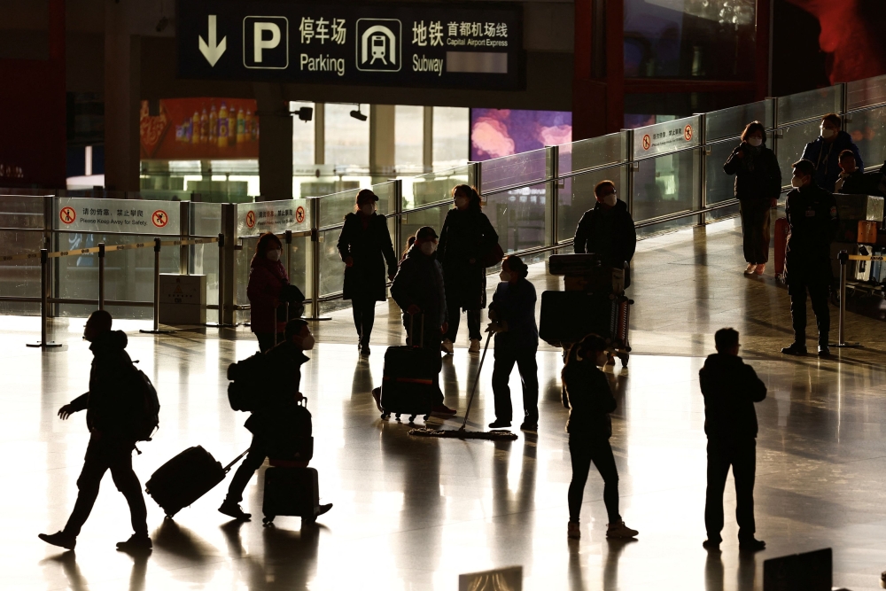 South Korea plans to resume issuing short-term visas for travellers from China on Saturday after China improved its Covid-19 situation. — Reuters pic