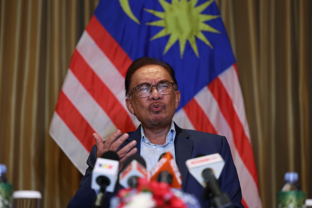 Prime Minister Datuk Seri Anwar Ibrahim speaks during a press conference in Bangkok February 10, 2023. ― Bernama pic