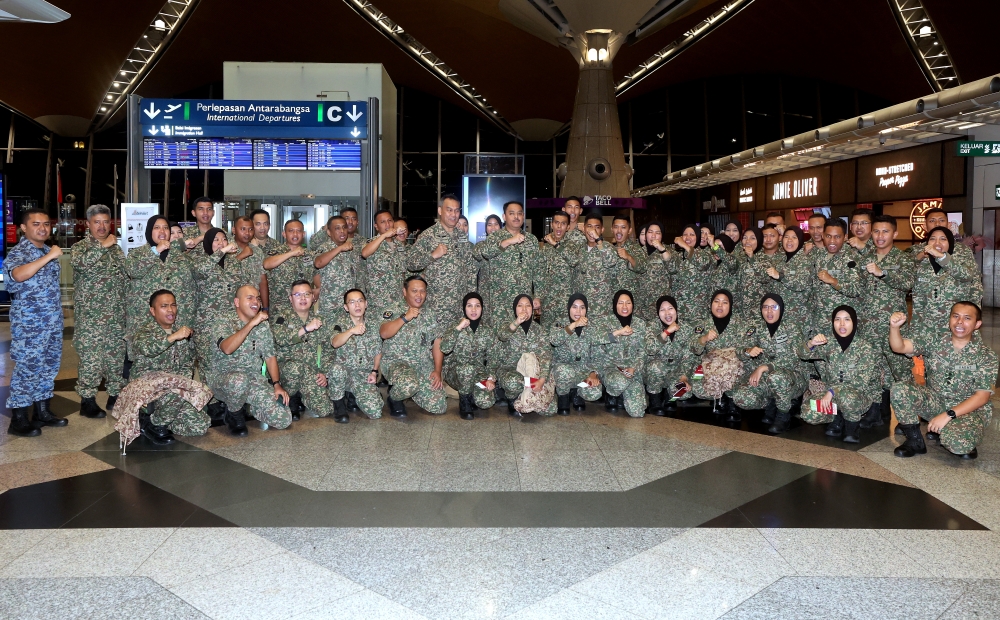 The MAF Medical Services team pose for a group picture ahead of their flight to Turkey, at the Kuala Lumpur International Airport in Sepang February 10, 2023. — Bernama pic