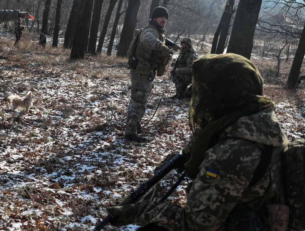 Retired foreign military professionals conduct a military exercise for Ukrainian service members, amid Russia's attack on Ukraine, outside of Kharkiv, Ukraine February 10, 2023. ― Reuters pic