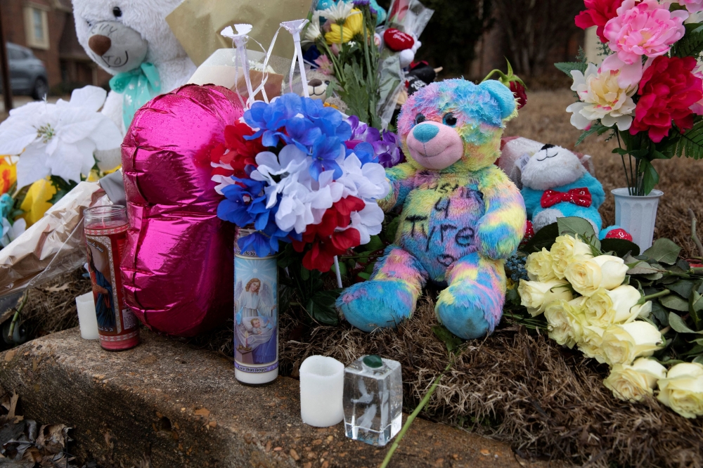 Stuffed animals and flowers are displayed at a memorial for Tyre Nichols at the intersection of Castlegate Lane and Bear Creek Cove in Memphis, Tennessee January 30, 2023.  ― Reuters pic
