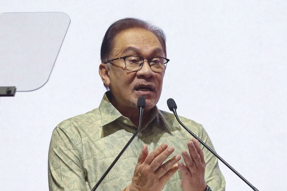 Prime Minister Datuk Seri Anwar Ibrahim speaks during the launch of the Housewife Social Security Scheme and MyFutureJobs 2023 Career Carnival in Kuala Lumpur February 11, 2023. ― Picture by Yusof Mat Isa