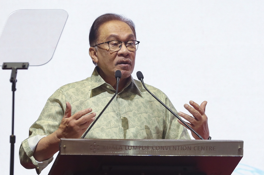 Prime Minister Datuk Seri Anwar Ibrahim speaks during the launch of the Housewife Social Security Scheme and MyFutureJobs 2023 Career Carnival in Kuala Lumpur February 11, 2023. ― Picture by Yusof Mat Isa