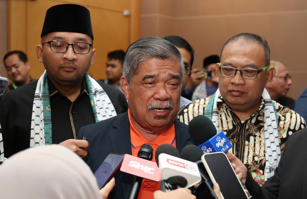 Agriculture and Food Security Minister Datuk Seri Mohamad Sabu speaks to the press after officiating the International Conference on Palestine Kuala Lumpur 2023, in Seremban February 11, 2023. — Bernama pic