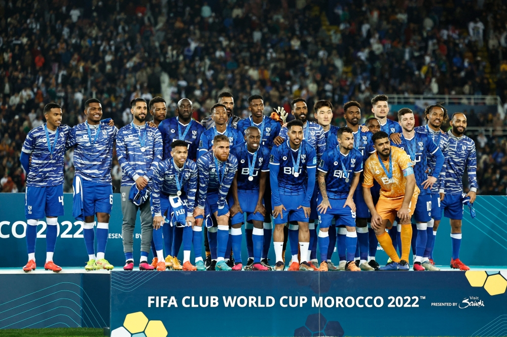 Hilal's players pose with their silver medals on the podium at the end of the Fifa Club World Cup final football match between Spain's Real Madrid and Saudi Arabia's Al-Hilal at the Prince Moulay Abdellah Stadium in Rabat on February 11, 2023. — AFP pic