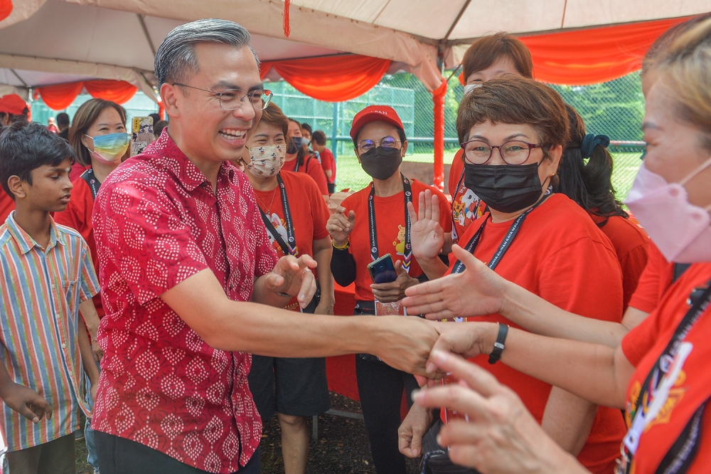 Communications and Digital minister Fahmi Fadzil attending the Lembah Pantai CNY Open House 2023 at Taman Seri Sentosa on February 12, 2023. — Picture by Miera Zulyana