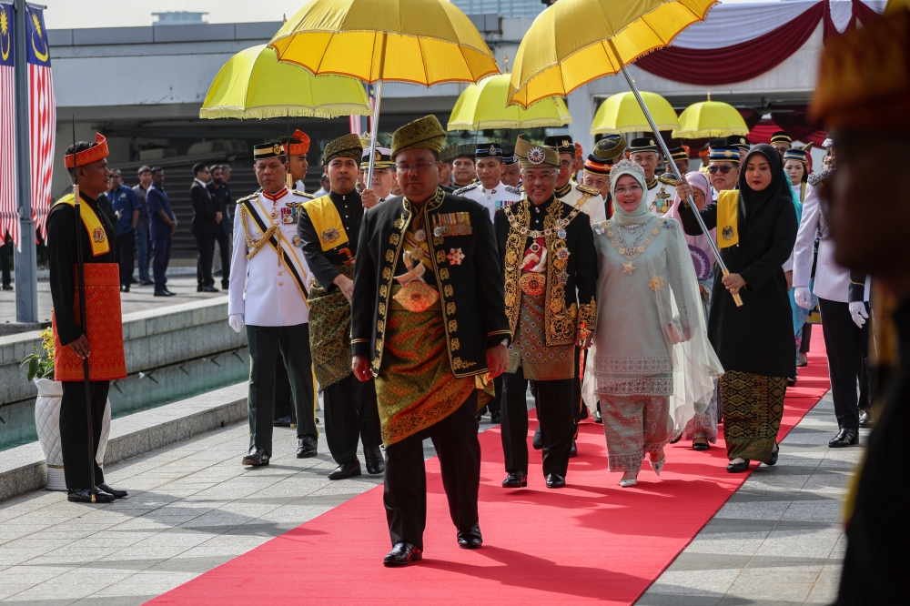 Yang di-Pertuan Agong Al-Sultan Abdullah Ri’ayatuddin Al-Mustafa Billah Shah and Raja Permaisuri Agong Tunku Hajah Azizah Aminah Maimunah Iskandariah arrive for the First Meeting of the Second Session of the 15th Parliament in Kuala Lumpur February 13, 2023. — Bernama pic