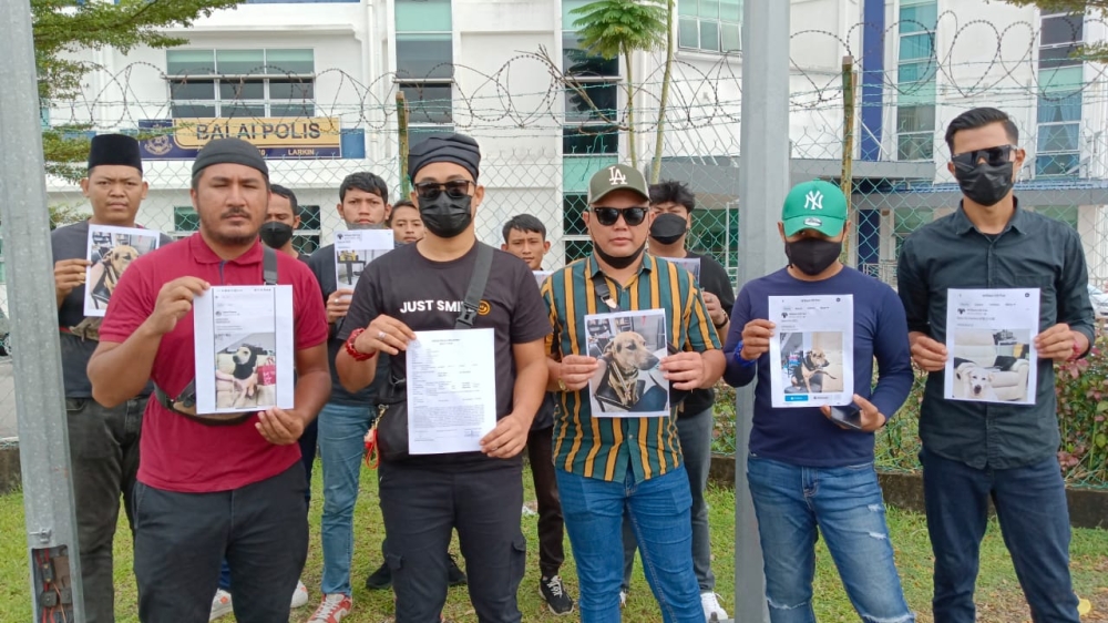 A Johor youth group wants authorities to act against a Facebook user for allegedly insulting the royal institution by naming his pet dogs with bestowed titles. — Picture by Ben Tan