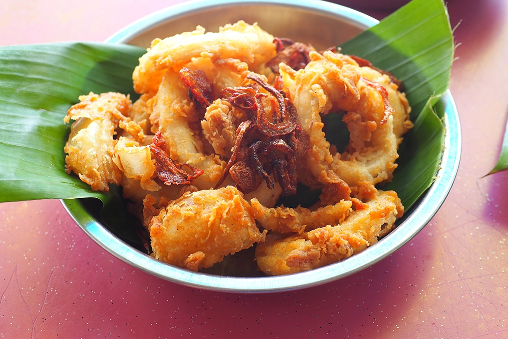 Pair your rice and vegetables with a side order of deep fried breaded calamari.