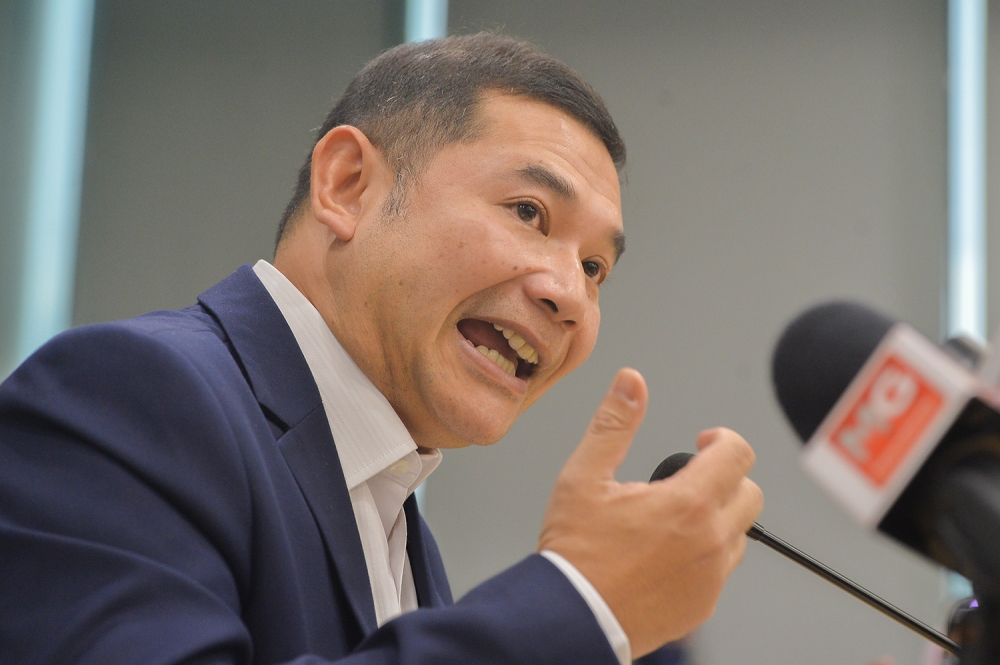 Minister of economic affair Rafizi Ramli speaks during a press conference in Putrajaya February 15, 2023. — Picture by Miera Zulyana