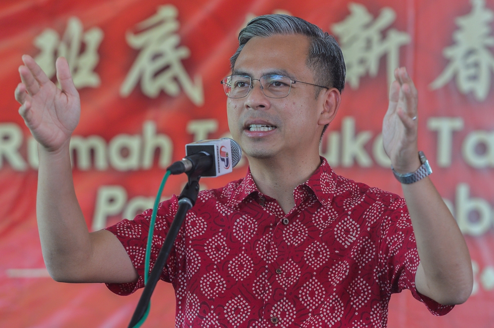 Communications and Digital Minister Fahmi Fadzil speaks during the Lembah Pantai CNY open house 2023 at Taman Seri Sentosa February 12, 2023. — Picture by Miera Zulyana