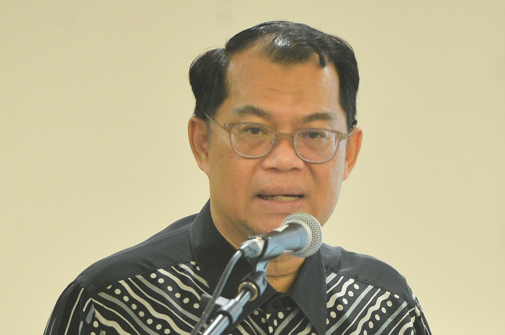 Auditor-General Datuk Seri Nik Azman Nik Abdul Majid speaks during the Auditor-General's Report 2021 series 2 at Putrajaya February 16, 2023. — Picture by Miera Zulyana