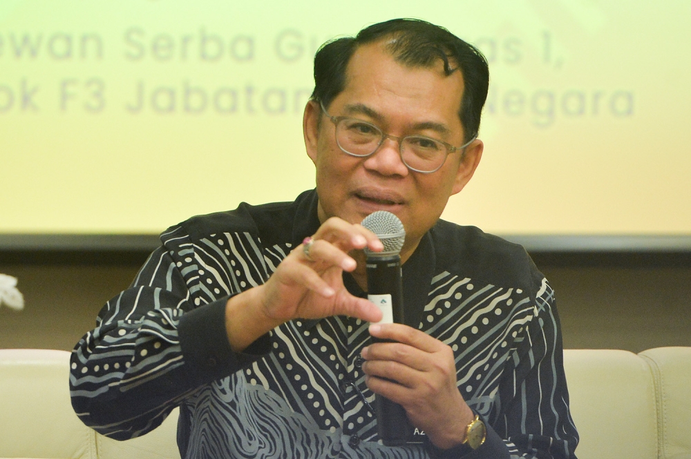 Auditor-General Datuk Seri Nik Azman Nik Abdul Majid speaks during the Auditor-General's Report 2021 series 2 at Putrajaya February 16, 2023. — Picture by Miera Zulyana