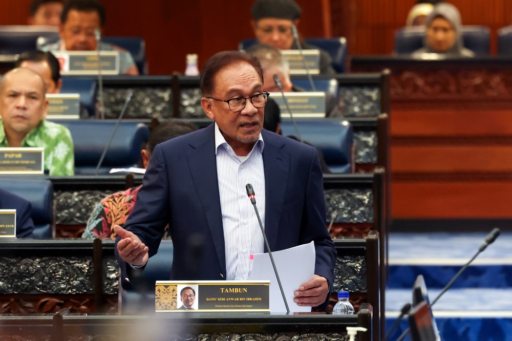 Prime Minister and Finance Minister Datuk Seri Anwar Ibrahim speaks during the Dewan Rakyat Session at Parliament in Kuala Lumpur February 16, 2023. — Bernama pic