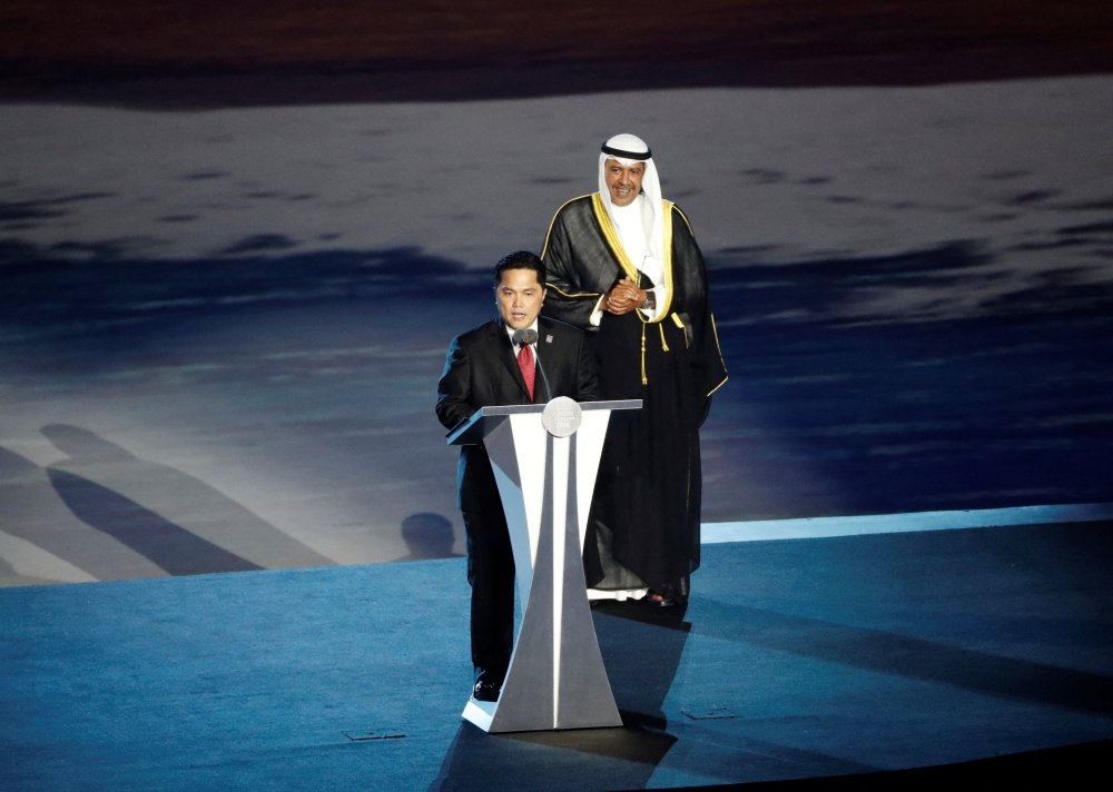 Erick Thohir, president of the Indonesian Asian Games 2018 Organising Committee, speaks next to  Sheikh Ahmad Al Fahad Al Sabah, president of the Olympic Council of Asia during the opening ceremony of the 2018 Asian Games at the GBK Main Stadium in Jakarta August 18, 2018. — Reuters pic