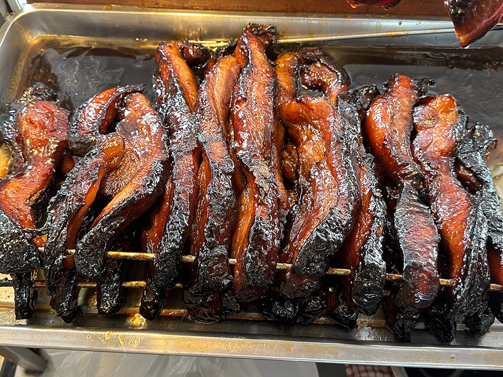 The sticky dark 'char siu' is luscious with fat and tender meat.