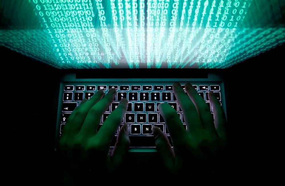 A man types on a computer keyboard in this illustration picture taken February 28, 2013. — Reuters pic