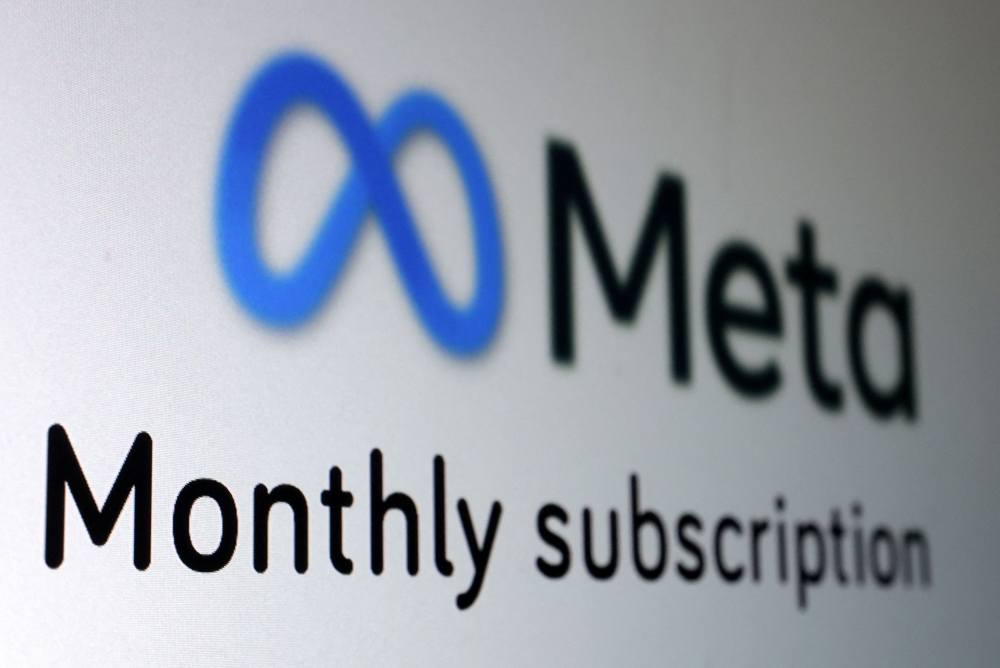 The Meta logo and the words 'Monthly subscription' are seen in this picture illustration taken January 19, 2023.  — Reuters pic