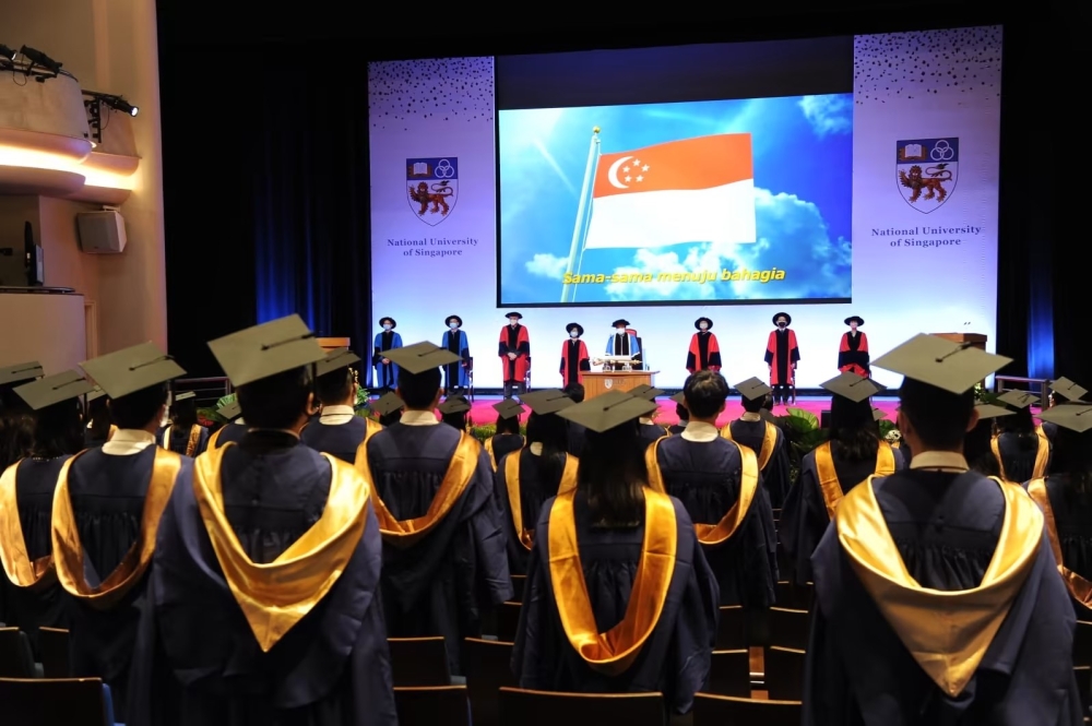 A convocation ceremony for the graduates of Class of 2020 and Class of 2021 from the National University of Singapore. — National University of Singapore/Facebook pic via TODAY