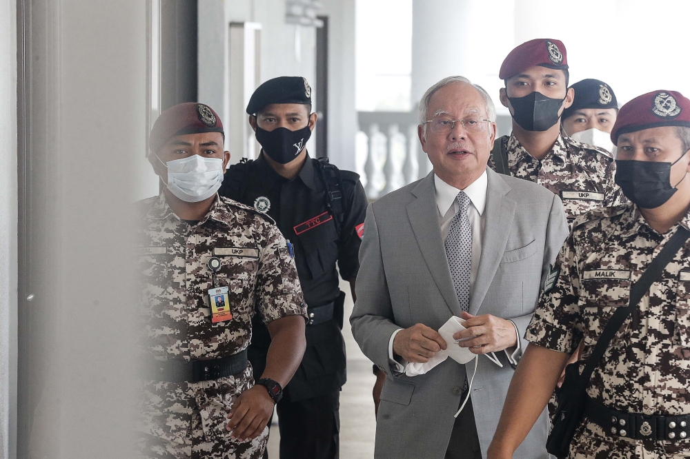 Former prime minister Datuk Seri Najib Razak is seen at the compound as he appears for the 1 Malaysia Development Berhad (1MDB) case at Kuala Lumpur Court February 8, 2023. — Picture by Sayuti Zainudin